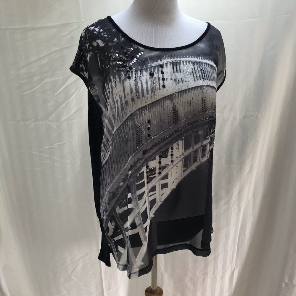 Print dolman sleeve top in with sequins. Size 16